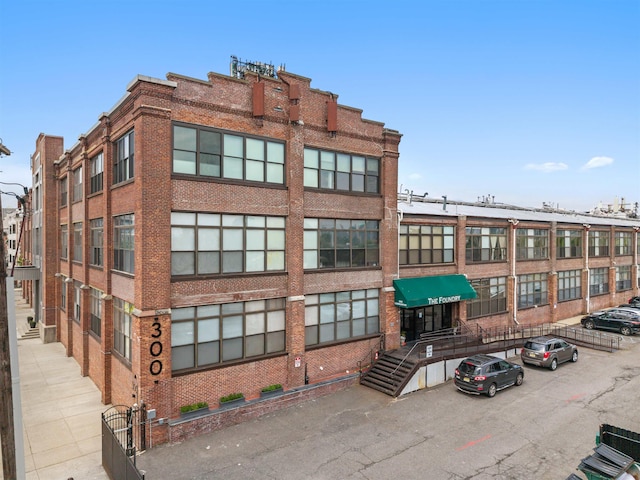300 Communipaw Ave Unit 11, Jersey City, NJ 07304 - view of property with uncovered parking