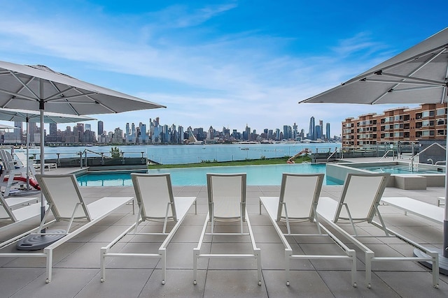 9 Avenue At Port Imperial Unit Ph8, West New York, NJ 07093 - community pool featuring a skyline view and a hot tub