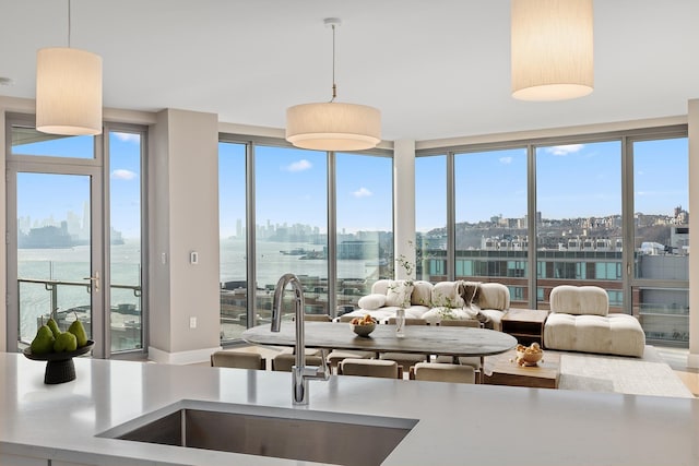 9 Avenue At Port Imperial Unit Ph8, West New York, NJ 07093 - kitchen with a skyline view, pendant lighting, and a water view