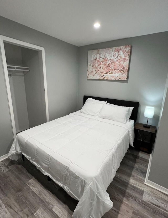 1611 71st St, North Bergen, NJ 07047 - bedroom with wood finished floors, recessed lighting, and a closet