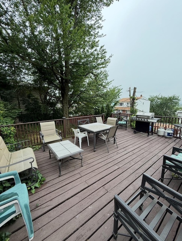 1611 71st St, North Bergen, NJ 07047 - wooden terrace featuring outdoor dining space and area for grilling