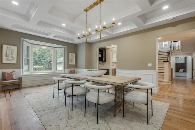 180 Union St, Montclair, NJ 07042 - dining space featuring coffered ceiling, ornamental molding, light wood-style flooring, and stairway