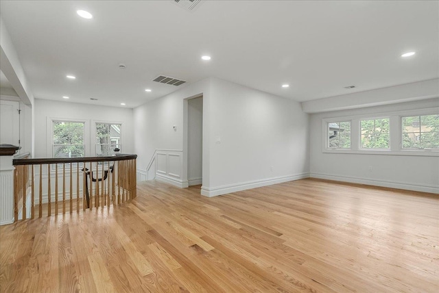 180 Union St, Montclair, NJ 07042 - empty room with healthy amount of natural light, light wood finished floors, and recessed lighting