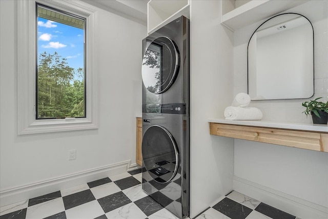 180 Union St, Montclair, NJ 07042 - washroom featuring stacked washer / drying machine and baseboards