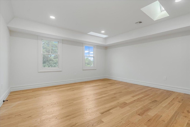 180 Union St, Montclair, NJ 07042 - spare room with a skylight, light wood-style floors, and recessed lighting