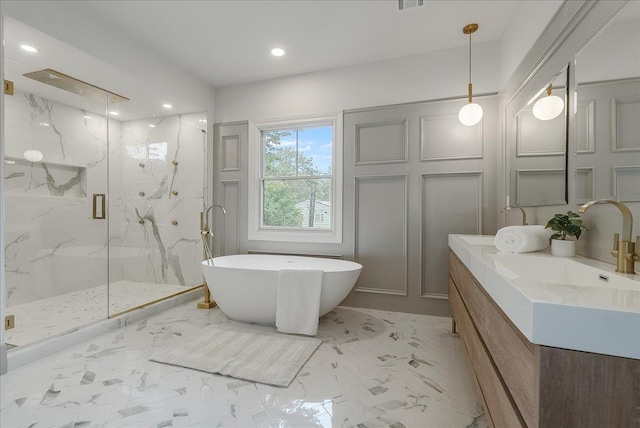 180 Union St, Montclair, NJ 07042 - full bathroom featuring marble finish flooring, a marble finish shower, a soaking tub, vanity, and recessed lighting