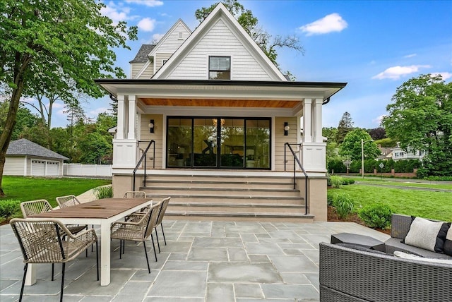 180 Union St, Montclair, NJ 07042 - back of house featuring covered porch, a lawn, and outdoor dining space