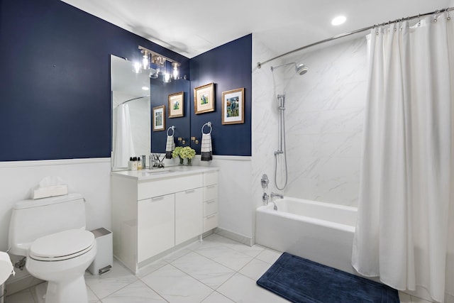 full bathroom with shower / bath combo, vanity, and toilet