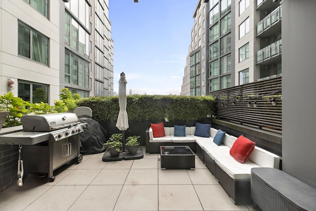 view of patio / terrace featuring area for grilling and an outdoor hangout area