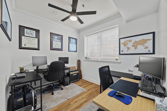 office with ceiling fan, ornamental molding, and hardwood / wood-style floors