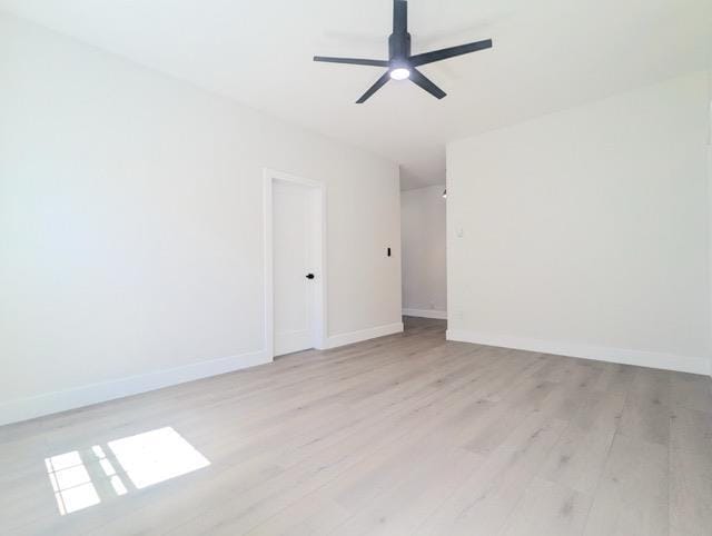 368 Palisade Ave, Jersey City, NJ 07307 - unfurnished room with light wood-style floors, baseboards, and a ceiling fan