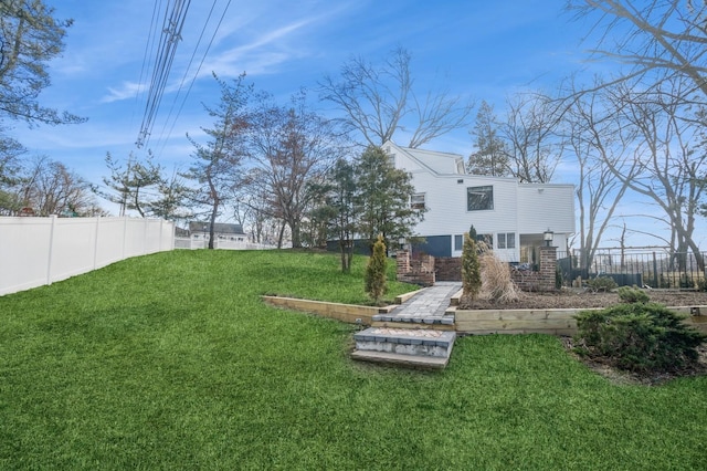 view of yard with fence