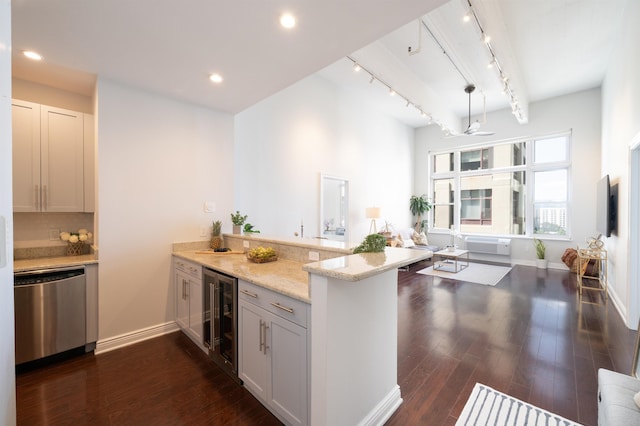 1500 Hudson St Unit 7U, Hoboken, NJ 07030 - kitchen with dishwasher, wine cooler, a peninsula, track lighting, and dark wood-style flooring