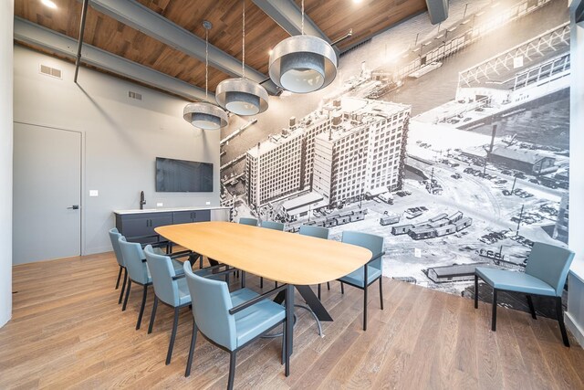1500 Hudson St Unit 7U, Hoboken, NJ 07030 - dining room with wooden ceiling with exposed beams and light wood finished floors