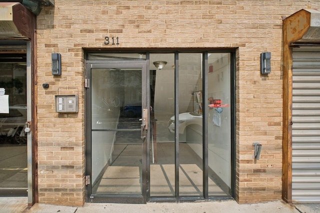 311 Palisade Ave Unit 3B, Jersey City, NJ 07307 - property entrance with brick siding