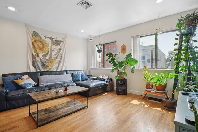 311 Palisade Ave Unit 3B, Jersey City, NJ 07307 - living room with wood finished floors and recessed lighting