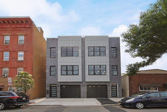 40 Wright Ave, Jersey City, NJ 07306 - view of property with a garage and cooling unit