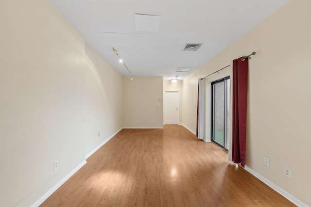 75 Liberty Ave Unit E13, Jersey City, NJ 07306 - unfurnished room with light wood-style floors and baseboards