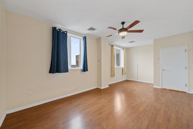 75 Liberty Ave Unit E13, Jersey City, NJ 07306 - spare room with wood finished floors and a ceiling fan