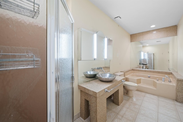 75 Liberty Ave Unit E13, Jersey City, NJ 07306 - bathroom featuring a bath, a shower stall, vanity, and tile patterned flooring