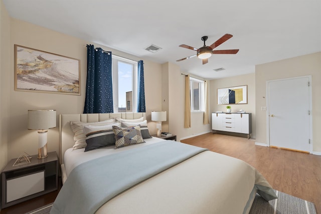 75 Liberty Ave Unit E13, Jersey City, NJ 07306 - bedroom with wood finished floors and a ceiling fan
