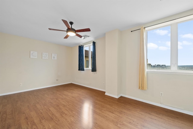75 Liberty Ave Unit E13, Jersey City, NJ 07306 - spare room with a ceiling fan and wood finished floors