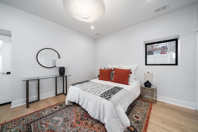 bedroom featuring light hardwood / wood-style floors