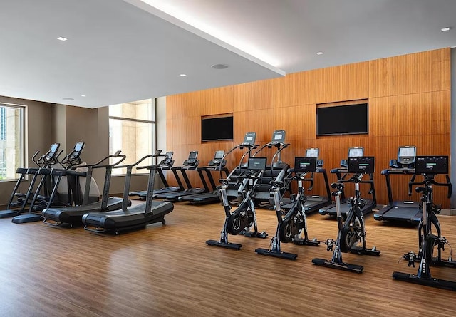 99 Hudson St Unit 2912, Jersey City, NJ 07302 - exercise room featuring wood finished floors and wooden walls