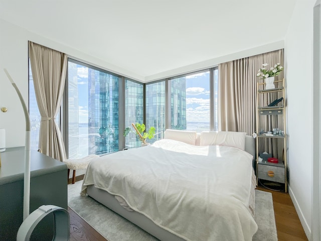 99 Hudson St Unit 2912, Jersey City, NJ 07302 - bedroom featuring wood finished floors and baseboards
