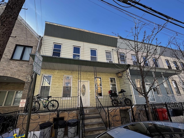 525 28th St, Union City, NJ 07087 - townhome / multi-family property featuring a porch