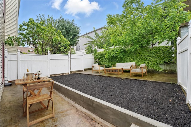 144 Nelson Ave, Jersey City, NJ 07307 - fenced backyard featuring a patio area and an outdoor living space