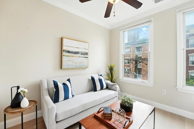 126 Dudley St Unit 315, Jersey City, NJ 07302 - living room with crown molding, healthy amount of natural light, ceiling fan, and wood finished floors