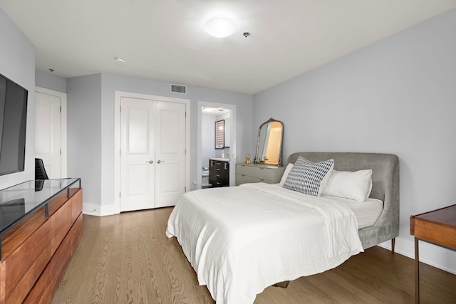 89 Jefferson St Unit 2D, Hoboken, NJ 07730 - bedroom with wood finished floors, baseboards, and a closet