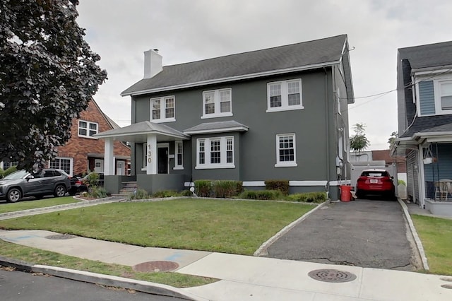 view of front facade with a front yard