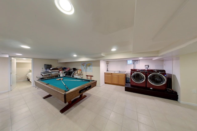 rec room with sink, pool table, washing machine and clothes dryer, and light tile patterned flooring