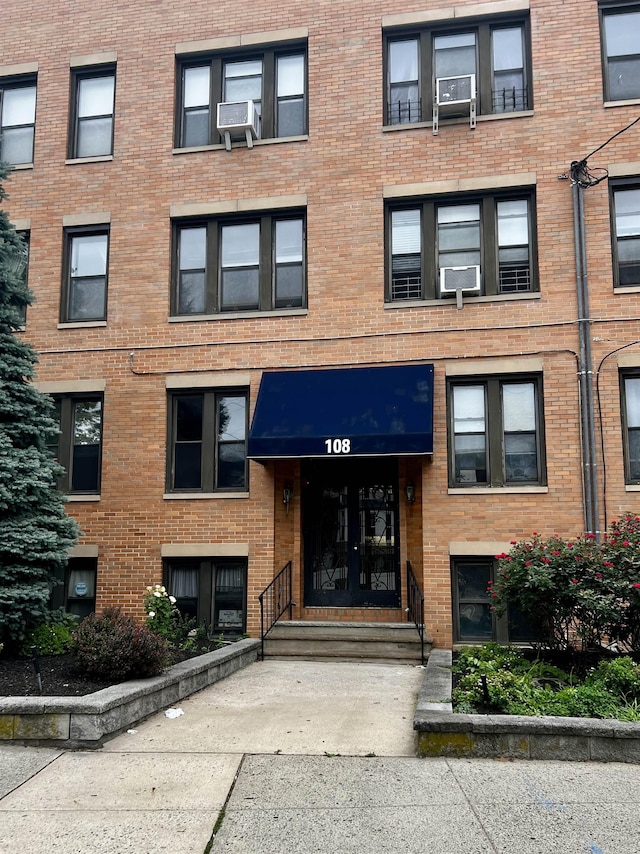 108 Palisade Ave Unit A5, Jersey City, NJ 07306 - view of building exterior with cooling unit