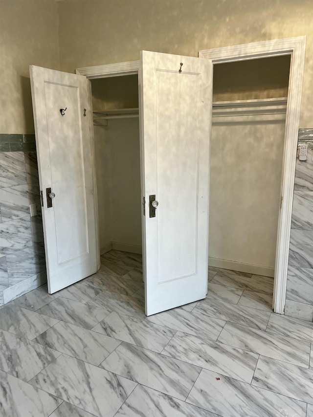 108 Palisade Ave Unit A5, Jersey City, NJ 07306 - unfurnished bedroom with marble finish flooring and a closet
