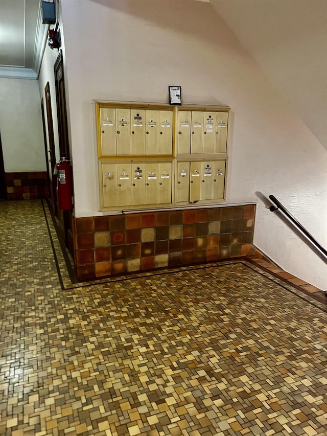 108 Palisade Ave Unit A5, Jersey City, NJ 07306 - hallway featuring mail area and vaulted ceiling