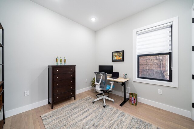 office area featuring light hardwood / wood-style floors