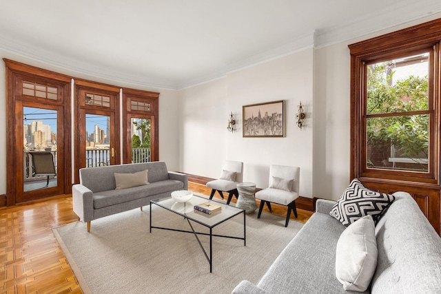 living room featuring crown molding