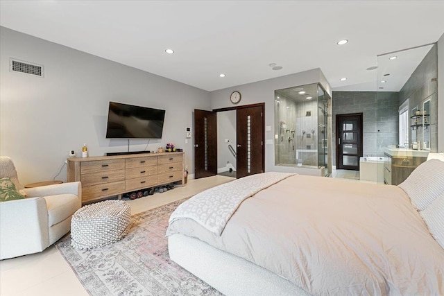 bedroom featuring recessed lighting, visible vents, connected bathroom, and tile patterned flooring