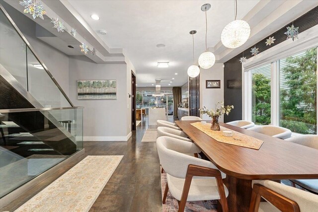 dining room featuring stairway, recessed lighting, and baseboards