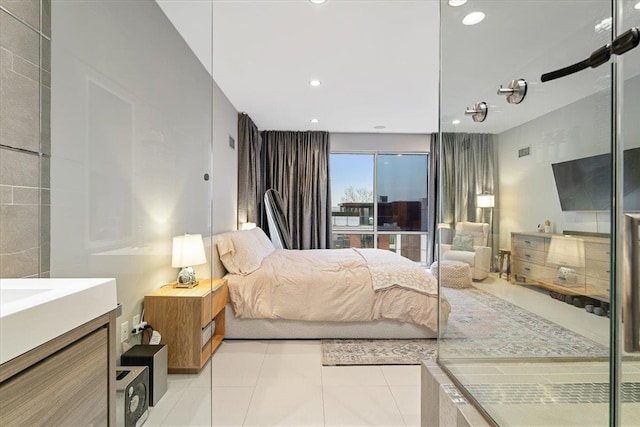 bedroom with light tile patterned floors, recessed lighting, and visible vents