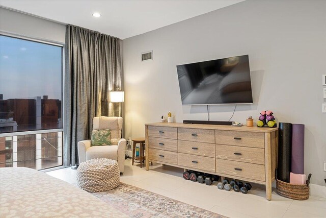 tiled bedroom featuring visible vents and recessed lighting