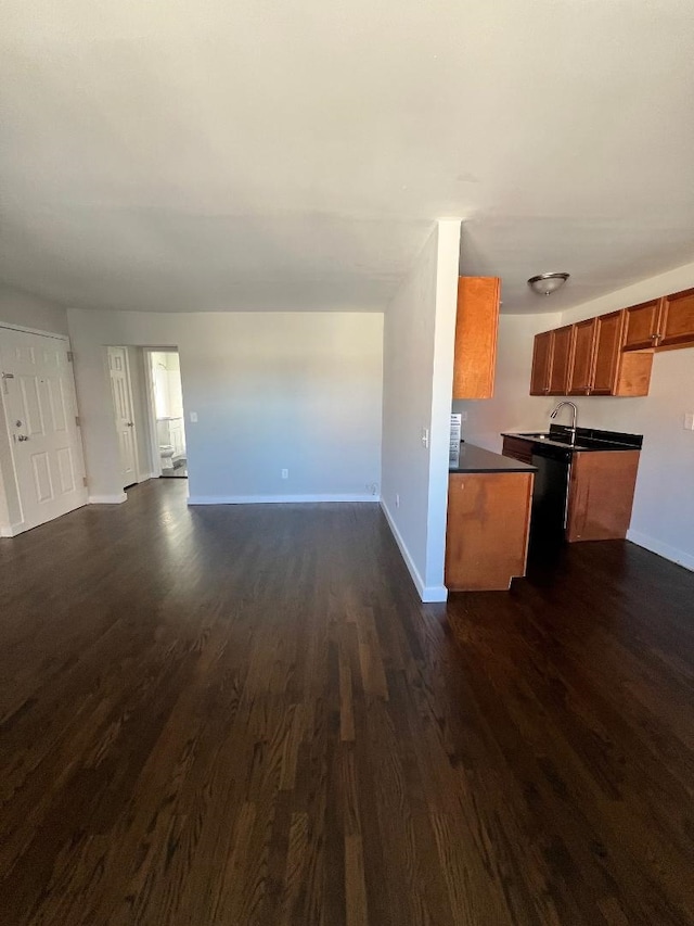 kitchen with dark hardwood / wood-style floors and sink