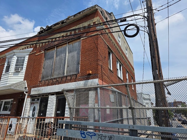 500 Grand Ave, North Bergen, NJ 07047 - view of home's exterior with brick siding and cooling unit