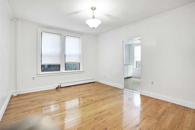 315 56th St Unit C1, West New York, NJ 07093 - unfurnished room with a baseboard heating unit, light wood-type flooring, and crown molding