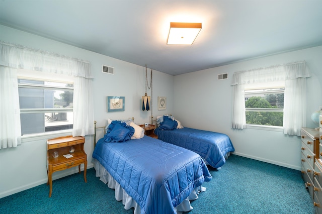 166 W 37th St, Bayonne, NJ 07086 - carpeted bedroom with baseboards