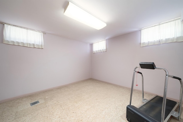 166 W 37th St, Bayonne, NJ 07086 - workout room with tile patterned floors