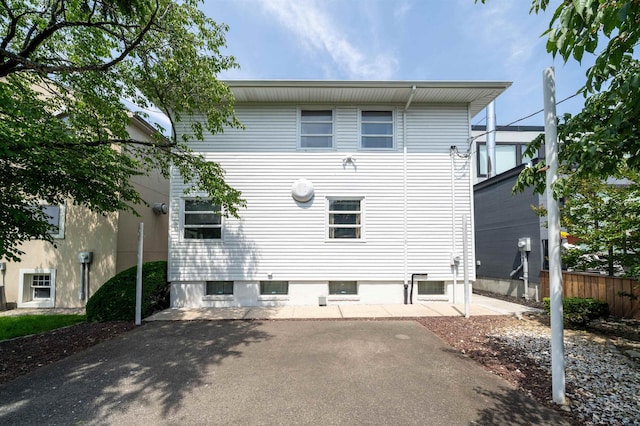 166 W 37th St, Bayonne, NJ 07086 - back of property featuring a patio